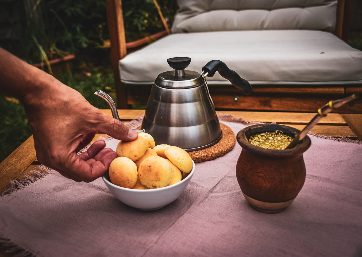 An Argentine-style sharing moment with mate and pastries